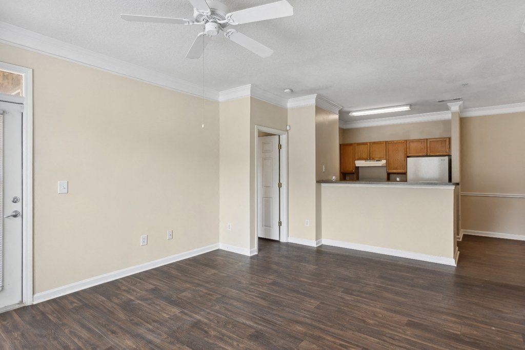 Living room with view of kitchen at Longwood Vista Apartment Homes in Atlanta GA